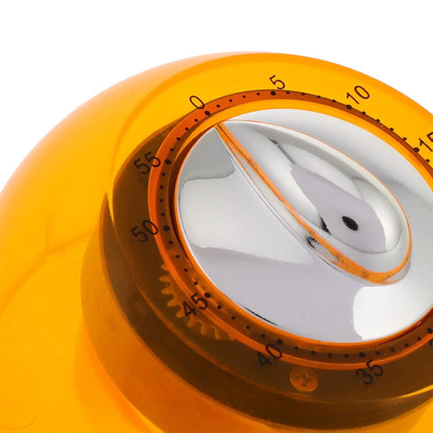 Close-up of a Mechanical Kitchen Timer Wind Up Countdown Clock For Cooking And Baking No Fuss Meal Prep And Home Office Use Reliable Reminder