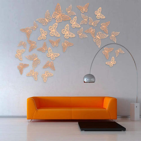 Room decor with 3D Butterfly Wall Decor Set featuring gold butterflies for wedding and party decor, includes 72 pieces.