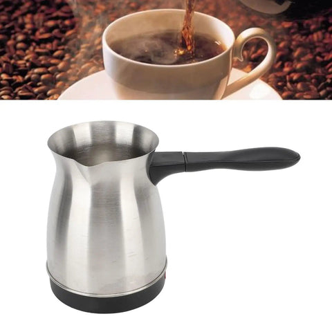 600W Stainless Steel Turkish Coffee Maker Kettle With Ergonomic Handle All In One Electric Tea And Milk Heater, Even Heating, 110V US Plug, 600ML Capacity, Durable Kitchen Pot shown next to a cup of coffee.