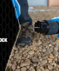 Heavy Duty 50 Amp Generator Extension Cord 100 Feet Jobsite Power Distribution Splitter showing twist-to-lock plug in use.
