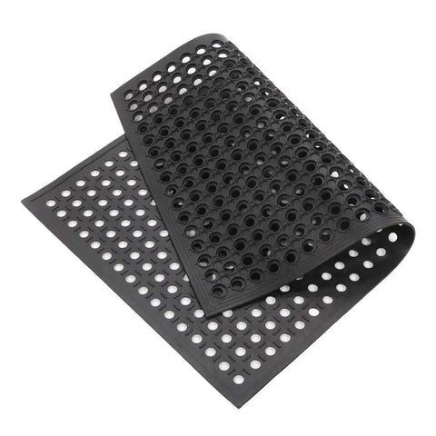 Heavy Duty Commercial Rubber Floor Mat Featuring Hexagonal Drainage Cutouts For Garage And Shop Kick Ass Non Slip Oil Grease Resistant Tough As Nails Level, 90x60 cm size, black rubber, open grid design.