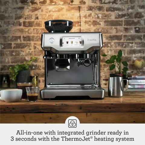Barista Touch Espresso Machine With Built In Grinder And One Touch Dose Control For Home Baristas on a kitchen counter