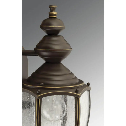 Detailed view of the Roman Coach Style 1 Light Outdoor Wall Lantern in Textured Black with clear seeded glass for classic outdoor lighting.