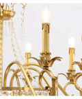 Close-up of Retro Brass Pendant Light, Villa Living Room Luxury Decorative Chandelier with gold finish and LED candle lamps.