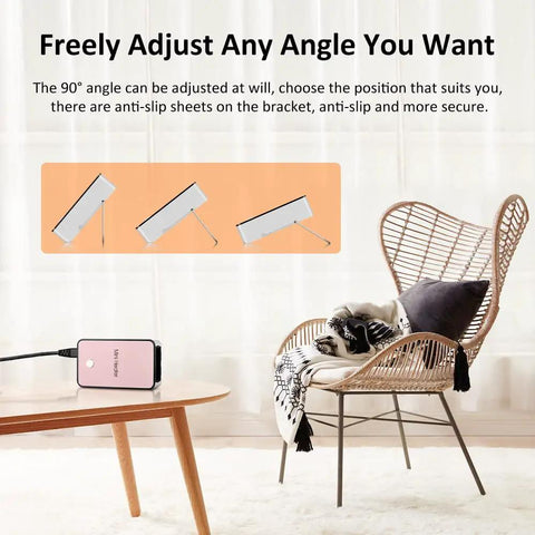 Portable Mini Space Heater For Home Office Desktop Pink With Auto Shut Off Safety Rotatable Stand With Anti Slip Base placed on desk