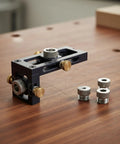 Dead On Positioning Guide With Swappable Stainless Bushings And Knurled Lock Knobs on wooden surface, showing precision jig and bushings.