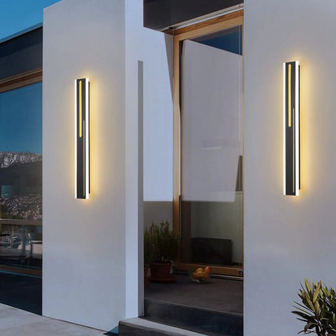 Outdoor LED Wall Light 31.5 Inch Black Sconce with Rectangular Acrylic Panel, mounted on modern exterior wall, illuminating porch