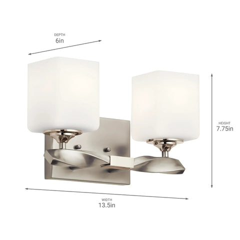 Two-Light Marette 13.5-Inch Vanity Light in Brushed Nickel with Satin Etched Cased Opal Glass for bathroom or powder room.