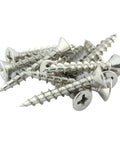Tough As Nails One Inch Phillips Flat Head Screws with Knockout Nickel Coating for Carpentry stacked together.
