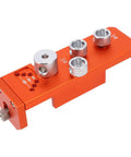 Heavy Duty Aluminum Drill Guide Tap Jig For Straight Shooting Thread Tapping And Reliable Industrial Machinery Assembly Projects That Get Done Right Every Single Time, orange and silver color with three drill gripping pieces.
