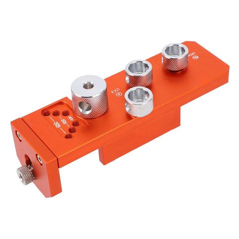 Heavy Duty Aluminum Drill Guide Tap Jig For Straight Shooting Thread Tapping And Reliable Industrial Machinery Assembly Projects That Get Done Right Every Single Time, orange and silver color with three drill gripping pieces.