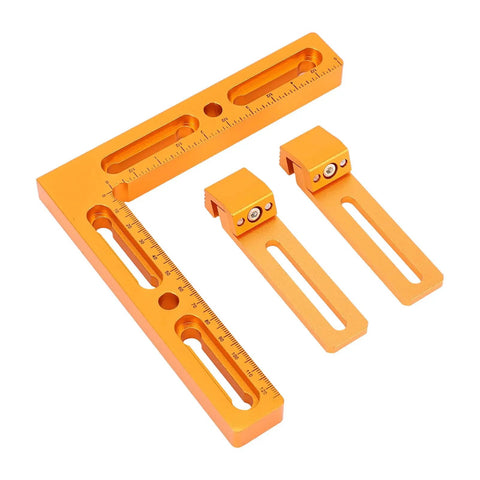 CNC Workpiece Positioning Fixture Kit With Pro Grade Aluminum Vise Clamps And Side Clamping for T Slot tables, showing rulers and slots.