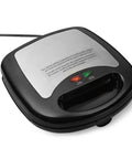 Amazon Basics 3 in 1 Sandwich Maker Panini Press With Removable Ceramic Coated Plates space-saving design and power indicator lights.