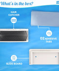 Large White Shower Hair Catcher With Flexible Silicone Bristles, adhesive tabs and slide board in the box.