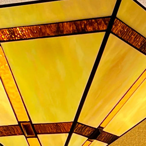 Close-up of 14 Inch Tiffany Style Stained Glass Mission Flush Mount Ceiling Light in brownish yellow with antique finish