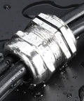 Heavy Duty Stainless Steel Cable Gland IP68 Adjustable Connector for 10 to 16mm cables, installed with water droplets showing weatherproof seal.