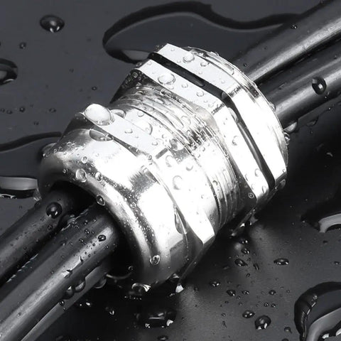 Heavy Duty Stainless Steel Cable Gland IP68 Adjustable Connector for 10 to 16mm cables, installed with water droplets showing weatherproof seal.