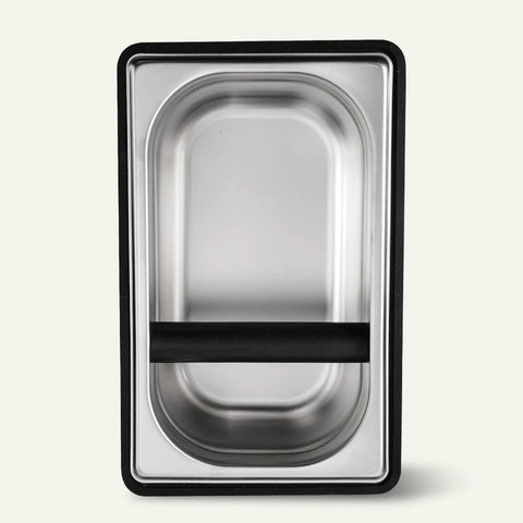 Built Like A Tank Stainless Steel Knock Box With Removable Interior Grounds Bin For Espresso Setups and Home Baristas Made For Busy Coffee Shops Without The Headache Featuring Durable Metal Construction top view of stainless steel interior with black frame
