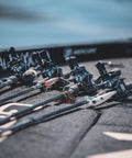 Four fishing rods with Laguna LT Spinning Reel 3 Plus 1 Ball Bearings 5.3 to 1 Gear Ratio on boat deck for freshwater use