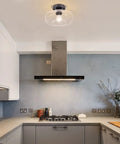 Seeded Glass Shade Flush Mount Ceiling Light With Matte Finish in kitchen setting for cozy modern vibe