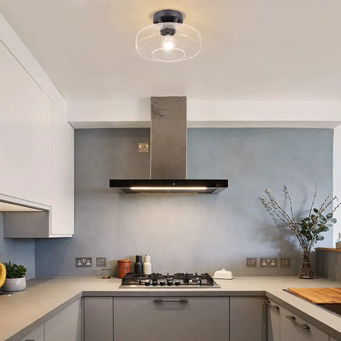 Seeded Glass Shade Flush Mount Ceiling Light With Matte Finish in kitchen setting for cozy modern vibe