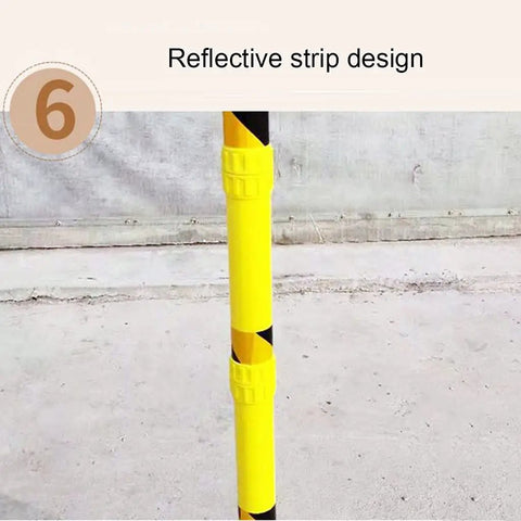 Yellow pole with reflective strip design on construction site