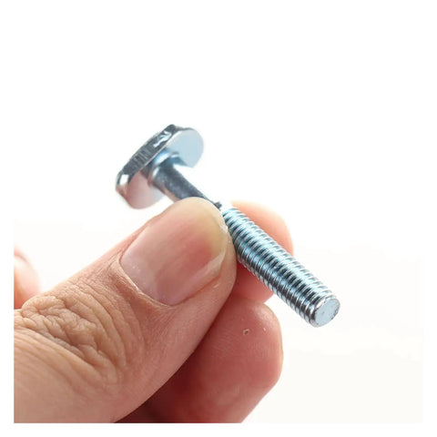 Close-up of Dope M6x40mm T Nut Sliding Screw from 10 Piece Set for T Slot Systems, held in hand for woodworking jigs.