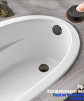 One And A Half Inch Black Tubular Bath Drain Kit With Tip Toe Touch Toe Drain Stopper Overflow Plug Face Plate Screws And Oil Rubbed Bronze Finish For No Fuss Easy Tub Drain Replacement installed in bathtub