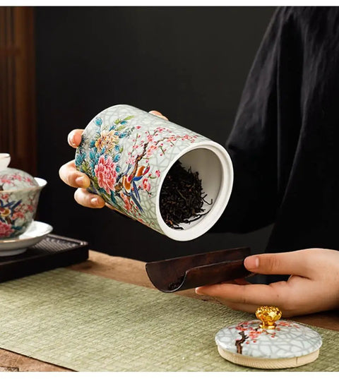 Premium Vintage Enamel Ceramic Tea Storage Jar Airtight Large Capacity Dry Food Canister For Coffee Beans Spices Nuts And Loose Leaf Tea, holding tea leaves.