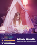 Girl reading in dimmable tent lit by smart RGB E12 base light bulb color changing with Alexa and Google Home 500 lumens
