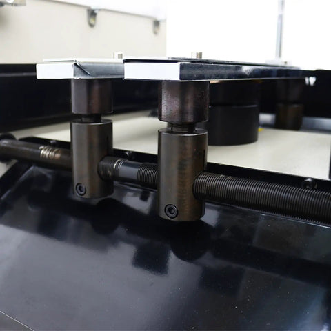 Close-up of Pro Grade Semi Auto PCB Cutting Machine for lead wires, showing steel frame and cutting mechanism.