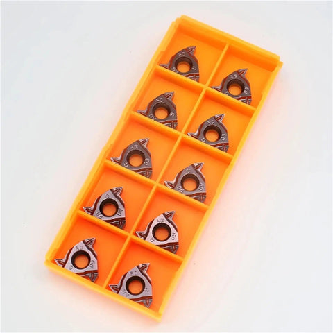 Carbide Threading And Turning Inserts RT1601G AG60 1210 in orange tray, triangular inserts for lathe tool holder
