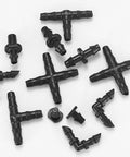 Drip irrigation fittings kit, 300 pieces, black plastic barbed connectors for 1/4 inch tubing including tees and elbows.