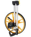 Badafaci Rolling Measuring Wheel, Foldable Handle with yellow wheel and durable handle in upright position.