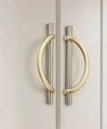 Brushed Brass And Brushed Nickel Cabinet Pulls 5 Inch Center To Center Curved Handles on kitchen cupboard