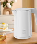 Fast Boil Electric Kettle With 1.0L Capacity 1200W 7 Temperature Settings for tea and coffee, stainless steel, on kitchen counter.