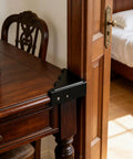 Heavy Duty Black Metal Corner Guards Set Of Four, Built Like A Tank Industrial Edge Protectors With Decorative Textured Finish For Wooden Furniture And Crafts on desk corner.
