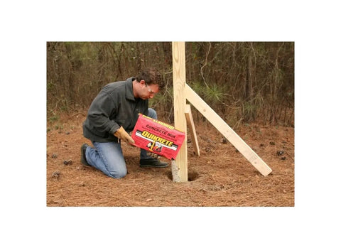 Man using Fast Setting Concrete Mix 50 Lbs Bag For Quick Set Concrete Projects DIY Friendly With Easy Installation Brown Gray Blend