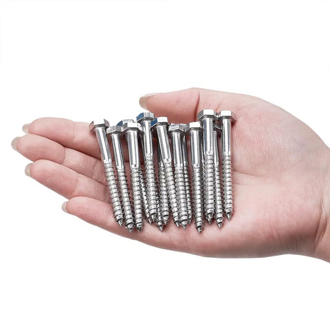 Top Quality 304 Stainless Steel Hex Lag Screws One Quarter Inch By Two Point Five Inches Tough As Nails Rust Resistant Wood Fasteners For Outdoor Decks And Flower Stands Twenty Five Count in a hand.