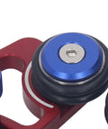 Close-up of blue adjustable rollers on a red frame for the Rugged Woodworking Bearing Feeder Set with Sliding Blocks Table Saw Feed Guide Roller Featherboard.