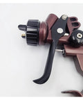 Close-up of Top Tier Pneumatic Paint Sprayer With 1.3 Mm Stainless Steel Nozzle Kit showing trigger and control dials.