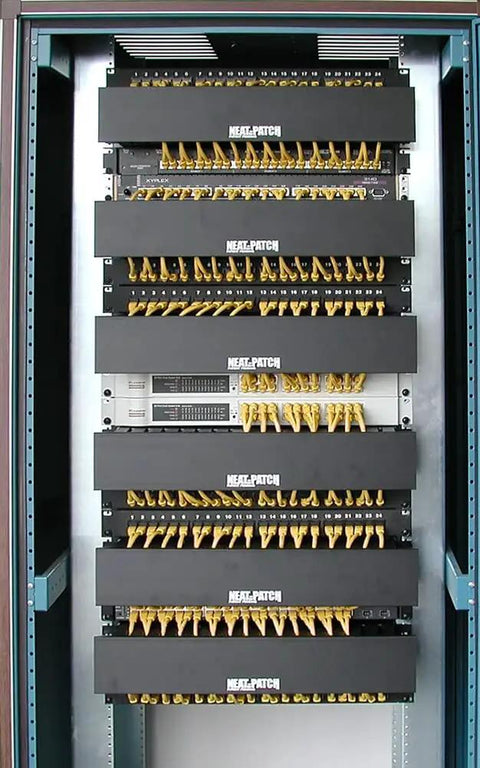 Three Pack Patch Cable Management Units for Clean Cable Organization on Racks, black non-conductive panels visible in rack.