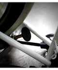 Ultra Slick Carbon Fiber Stop Disc For Folding Bike With Premium Titanium Hardware mounted on a bike frame for stability.