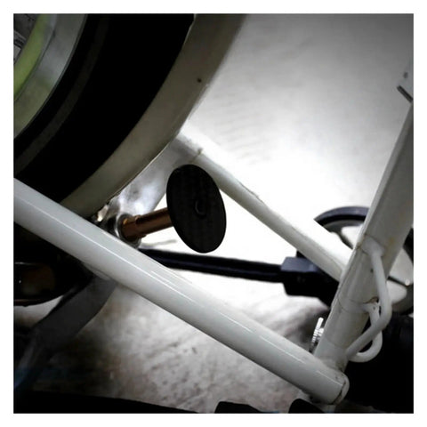 Ultra Slick Carbon Fiber Stop Disc For Folding Bike With Premium Titanium Hardware mounted on a bike frame for stability.