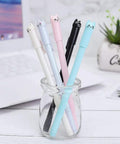 Cute Cat Gel Pens 0.5mm Set Of 12 For School And Office, Kawaii Style Black Ink, pens in jar with colorful cat designs on desk