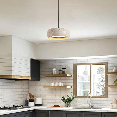 Modern Dome Yellow Travertine Pendant Light in a kitchen, round shape, natural stone, ideal for over sink or bedside.