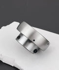 Two Pack SB20516 Insert Ball Bearings With Set Screws 25x50x28mm angular view on white surface