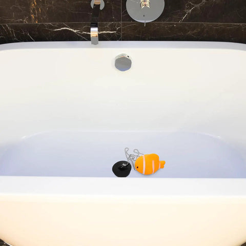 Fish Bathtub Drain Stopper with Chain Rubber for Shower Drains in a modern bathtub with an orange fish design.