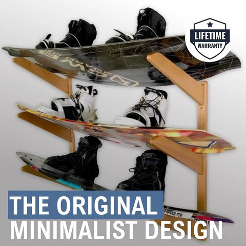Premium Heavy Duty Solid American Oak Snowboard Wall Rack Holds Three Boards Securely with Extra Stash Zone for Helmets Goggles and Ski Poles for Your Garage or Man Cave Flex Display featuring three snowboards and boots.