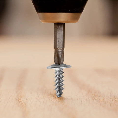 Top Shelf Eight By Three Quarter Inch Phillips Truss Head Wood Metal Screws Bulletproof 410 Stainless Steel in use with drill.